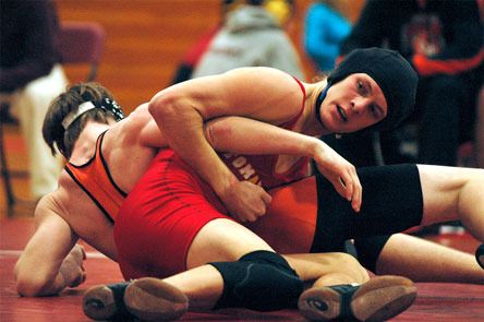 Tanner Bengen fights for controlling position against Granite Falls.