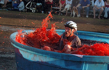 Everett resident Mike Gilroy hops into the final obstacle