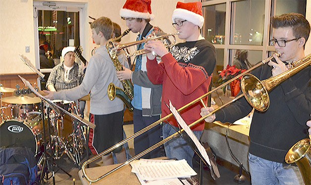 The Dominant 7 perform at an event with Santa Claus to try to raise money for a Marysville-Pilchuck High School music trip to Disneyland.