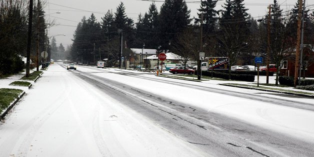 Snow covers Cedar Avenue in Marysville Nov. 22.  More snow and freezing temperatures over the next couple of days forced many closures in Marysville.