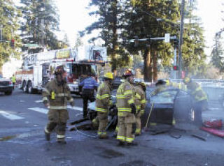 Marysville firefighters respond to an accident at the intersection of 88th Street and State Avenue Dec. 15.