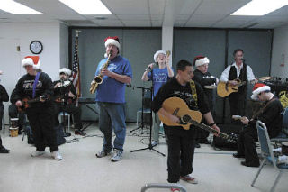 Voices of the Village perform enthusiastically at the Ken Baxter Senior Community Center in Marysville Dec. 9.