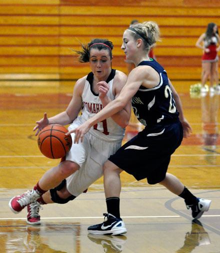 Marysville-Pilchuck sophomore guard Amanda Klep makes contact as she drives against Burlington-Edison junior guard Sydney Brown on Dec. 29.