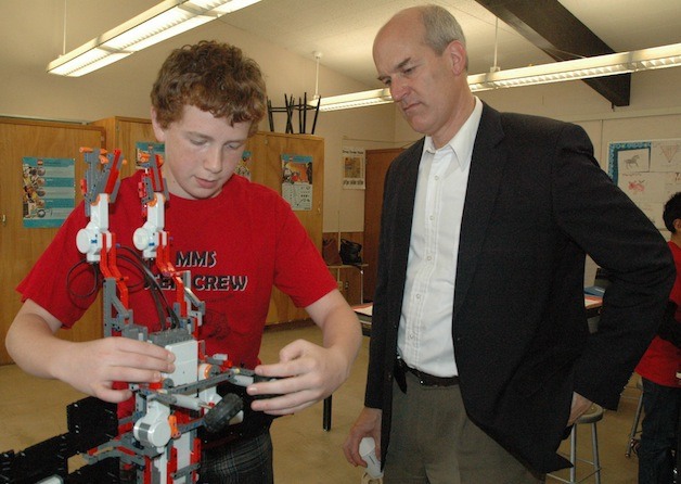 Marysville Middle School eighth-grader Peyton Draper explains his robot to U.S. Rep. Rick Larsen on May 15.