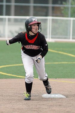 Sacha Clow starts to run after a ball is put in play.