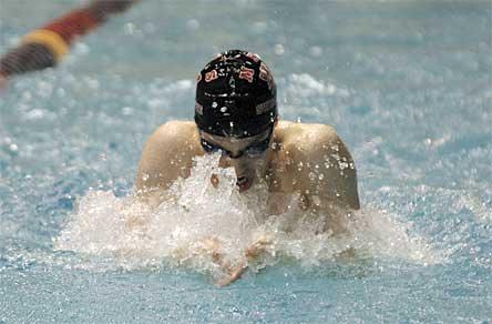 M-P junior Spencer Girard swims his way to a new school record in the 100-yard breaststroke.