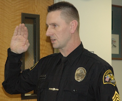 Marysville Police Sgt. Rick Sparr is sworn in at his new rank on Feb. 11.