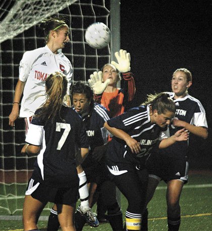 Arlington keeper Savanna Decota