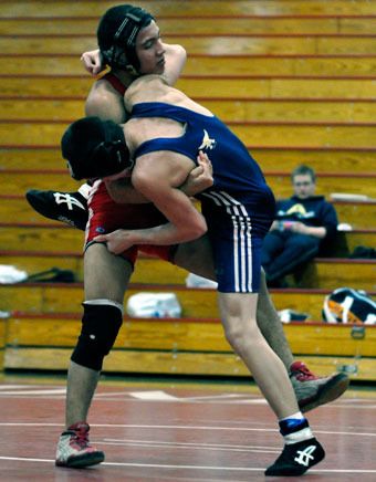 Marysville-Pilchuck junior Christian Mendoza trips opponent