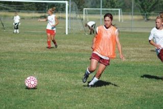 Midfielder Kiely Cordon passes the ball.