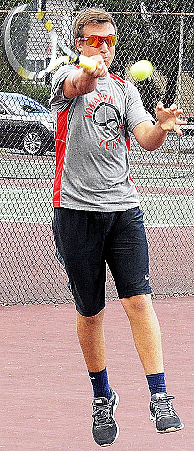 Marysville-Pilchuck junior Trent Tingelstad plays singles during M-P's game against Monroe Sept. 9.