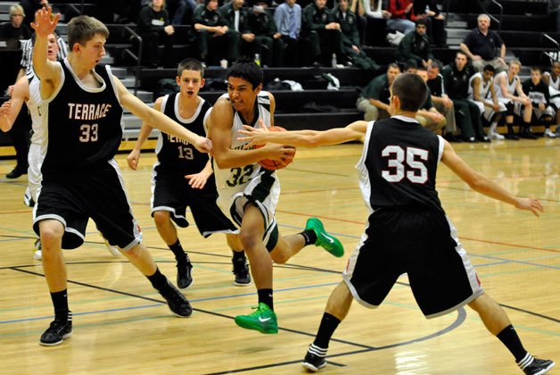 Marysville Getchell junior guard Cullen Zackuse thunders down the lane against Mountlake Terrace on Dec. 16