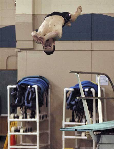 The Tomahawks placed 1-3 in diving. Derek Kent performs a reverse finish