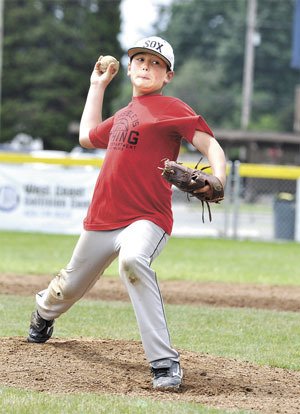 Marysville Nationals All-Stars ace pitcher J.D. Trueax winds up during practice Saturday