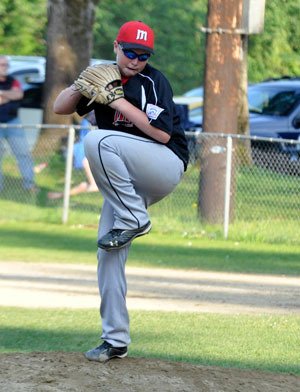 Pitcher Nate Peterson of the Marysville Little League Junior All-Stars throws a pitch to a Stilly Valley batter during the District 1 All-Star Championship game on July 9.