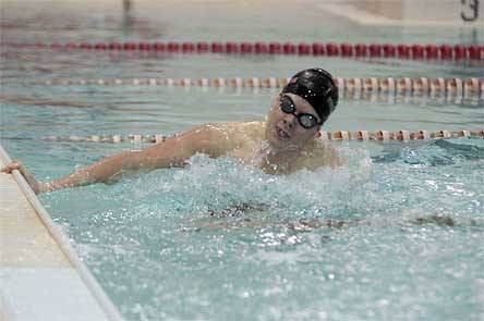 Senior Brandon Caldwell in the 100-yard breaststroke at the preliminary round of the District 1 meet.