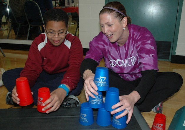 Josiah Frank and Jessica Callagan practiced competitive cup-stacking at the Marysville YMCA during one of its previous Healthy Kids Days.