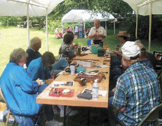 Laura Fraser demonstrates wood carving at a Spit-n-Whittle event of the Quil Ceda Carvers. She is the featured carver at this year’s “Artistry in Wood” show at the Evergreen State Fairgrounds in Monroe April 19 and 20.