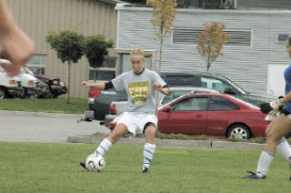 Reggie Smithson controls the ball