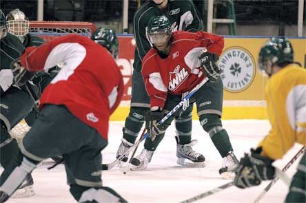 Travis Sherer/Staff Photo Zack Dailey calls for the puck from teammate