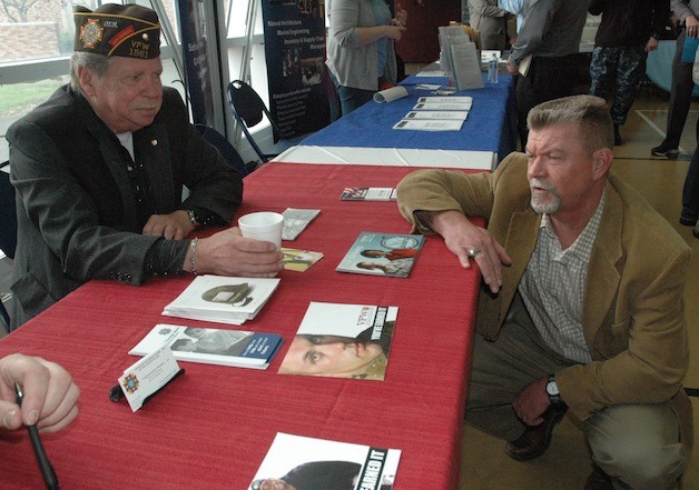 Arlington Veterans of Foreign Wars Post 1561 Community Affairs Chair Bill Morse chats with Mike Schanche