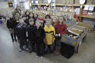 The Marysville Co-op Program’s third-grade class shows off the 1