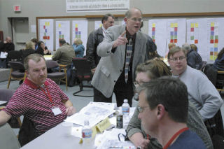 Marysville School District Superintendent Dr. Larry Nyland speaks with members of the smaller discussion groups at the Citizens Planning Committee meeting Feb. 12