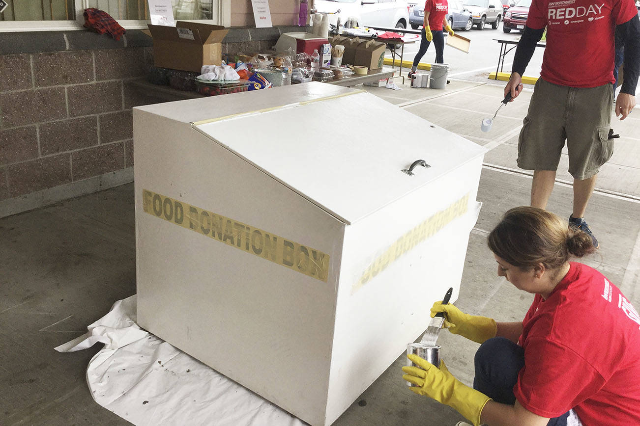 Realty workers give food bank a Red Day makeover