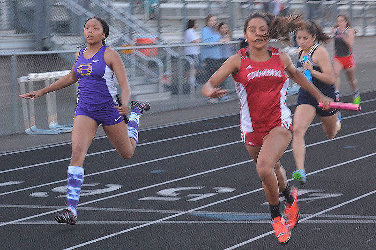 Steve Powell/File photo                                 Trina Davis of Marysville-Pilchuck High School sprints across the finish line at a meet this year. She was named to the Wesco North all-league team three times in track.