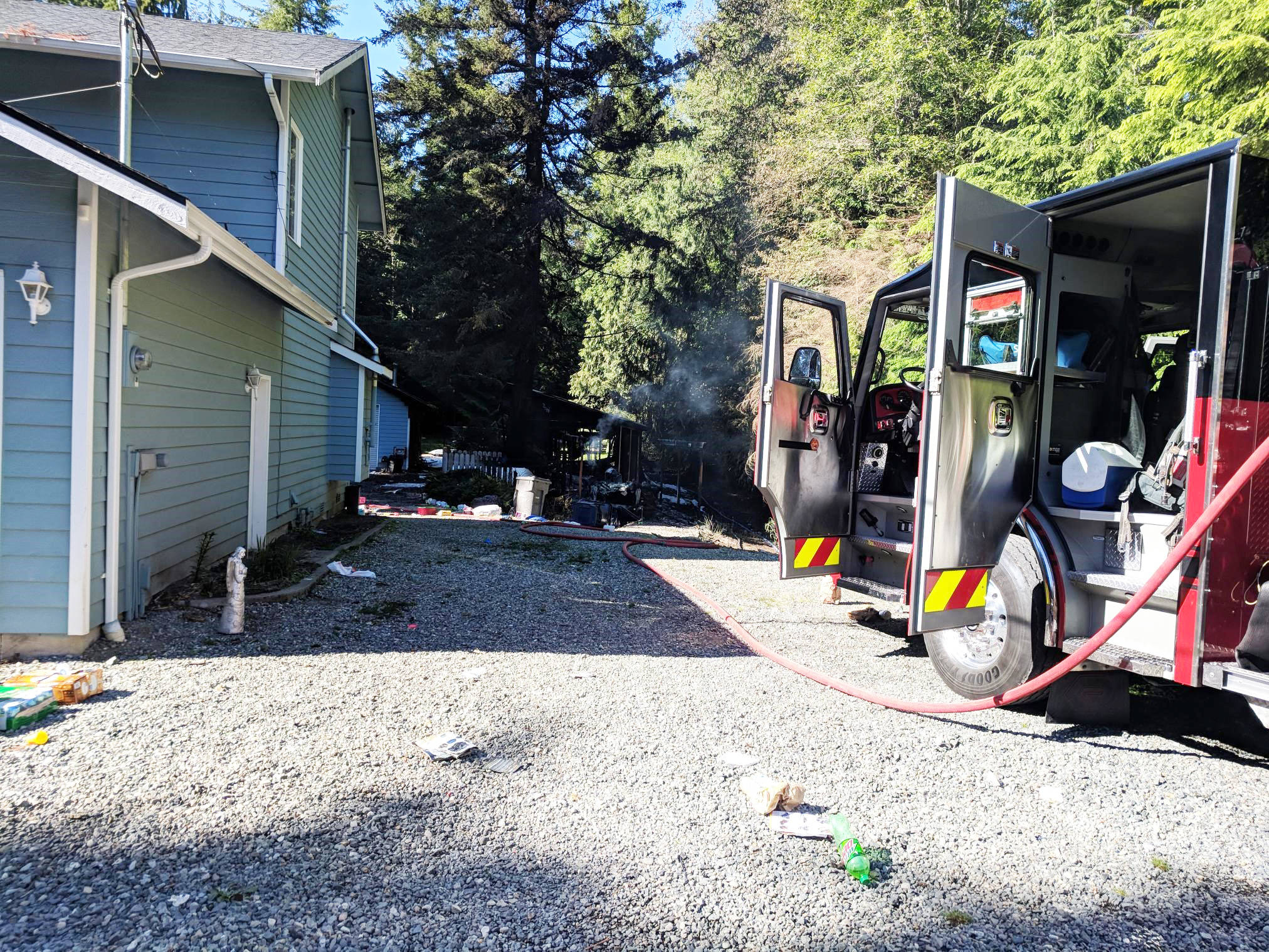 Arlington fire crews responding to a suspicious house fire in the 9300 block of 164th Street NE on Monday afternoon arrived to find a man with an apparent self-inflicted gunshot wound.