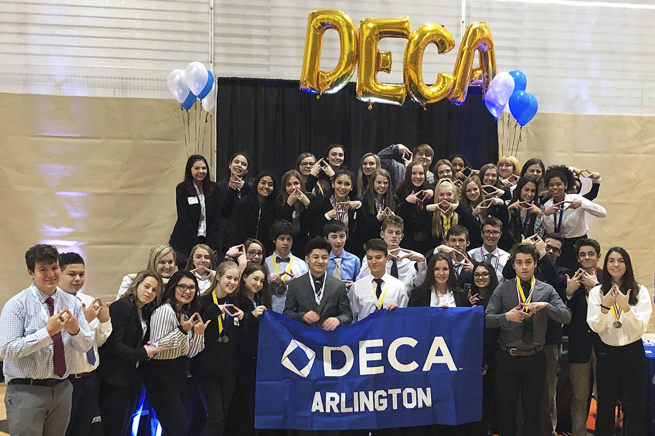 AHS DECA sets qualifying record at area competition, brings home most awards